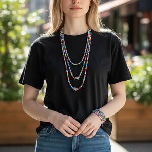 7 Colorful Beaded Strands. Neckace and/or Bracelet use. Sizes vary from 20”-42”